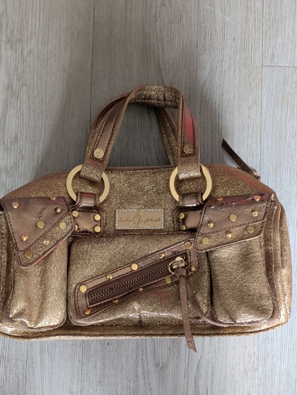 Baby Phat metallic gold bowling-style satchel bag,